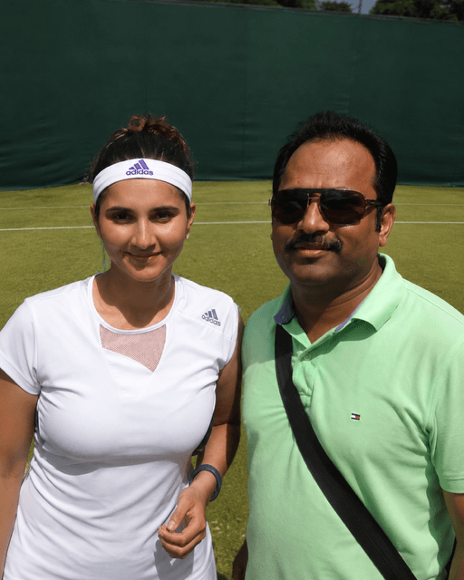 Dr. Vijay Kumar watching Sania Mirza compete at Wimbledon 2013