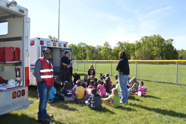 Dr. Vijay Kumar serving as an American Red Cross Emergency Response Vehicle volunteer