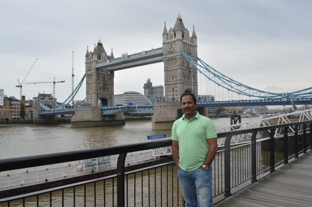 Dr. Vijay Kumar visiting London near Tower Bridge