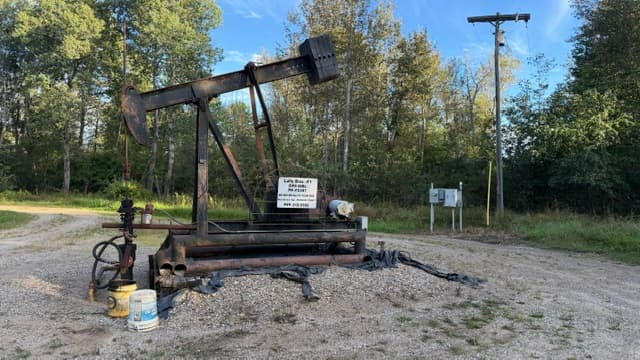 Pumpjack oil well Lally Brothers No. 1 in the woods near West Branch, Michigan